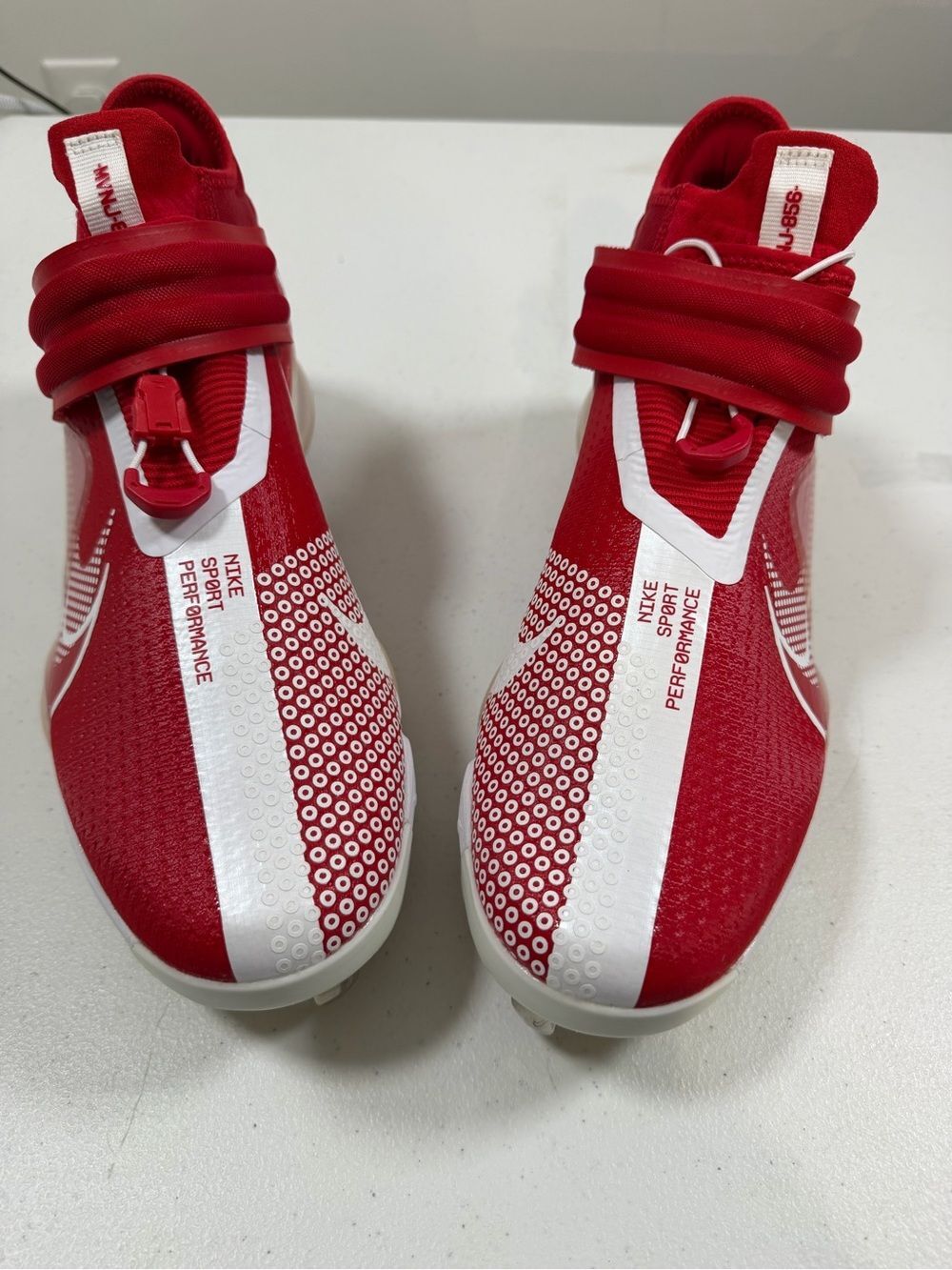 Nike Red and White Sport Performance Cleats by Trout
